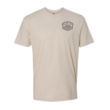Front of Blue Ox 2025 natural t-shirt with small western-style logo patch on chest