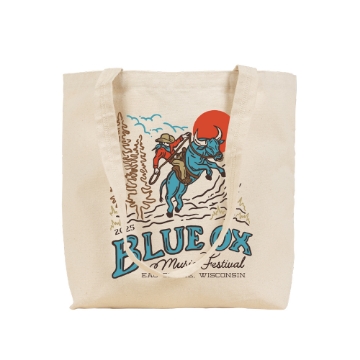 Natural canvas tote bag with 2025 Blue Ox Festival graphic of rider on blue ox and red sun in background