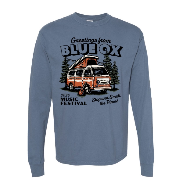 Blue long sleeve t‑shirt featuring a retro van illustration with “Greetings from Blue Ox,” pine trees, and 2026 Music Festival text.