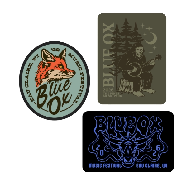 Set of Blue Ox stickers including a fox design, Bigfoot playing a banjo, and Blue Ox Music Festival artwork in muted outdoor colors